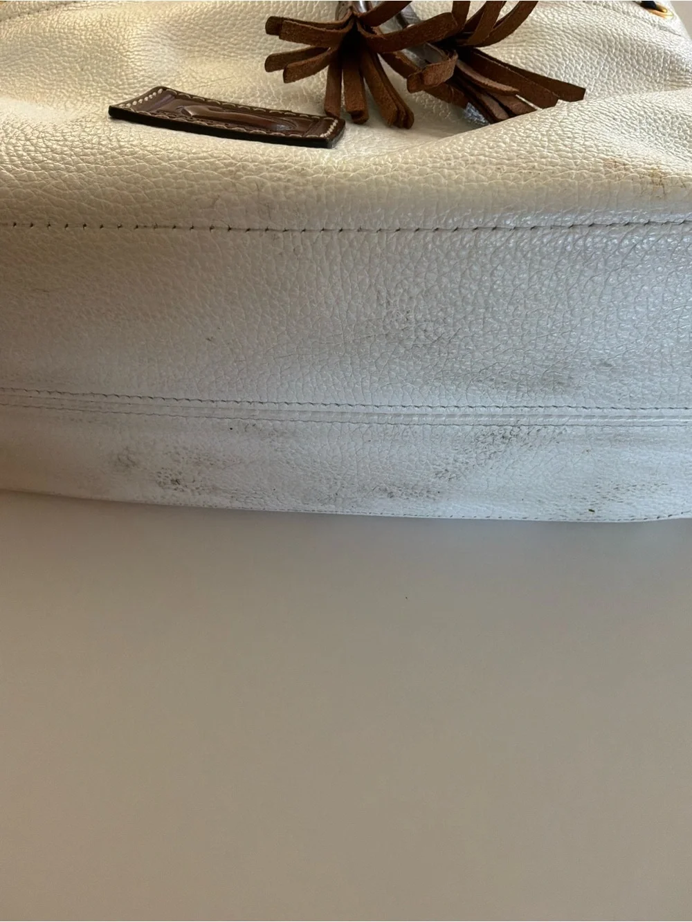 Dooney & Bourke White Pebbled Leather Satchel with Brown Trim and Tassel